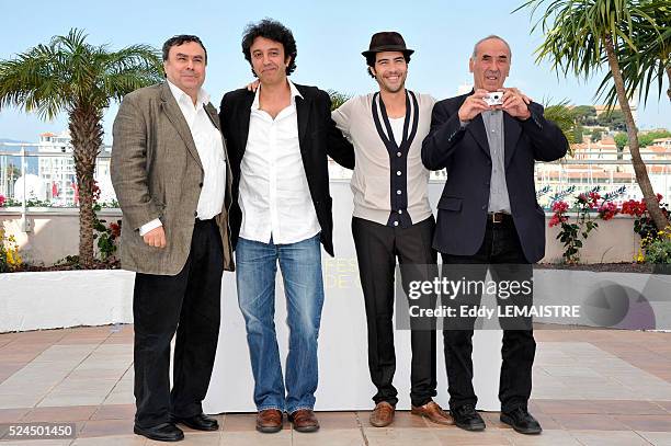 Ismael Ferroukhi, Tahar Rahim, Benjamin Stora and guest at the photo call for "Les hommes libres" during the 64th Cannes International Film Festival.