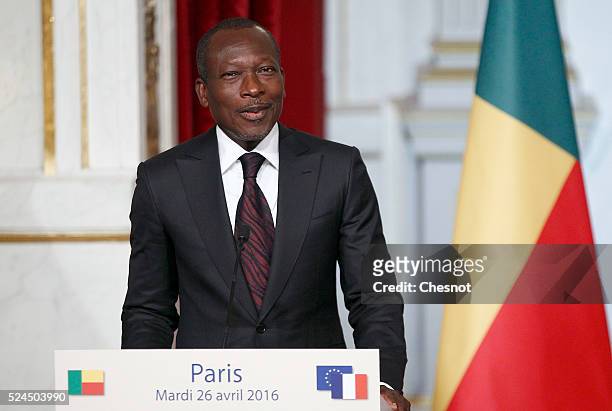 Benin's President Patrice Talon makes a statement during a press conference with French President Francois Hollande at the Elysee Palace on April 26,...