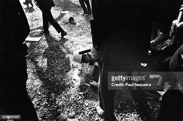 Policeman jumps on top to physically subdue a protester, while surrounded by other policemen, during the SDS 'Days of Rage' protest, Chicago,...