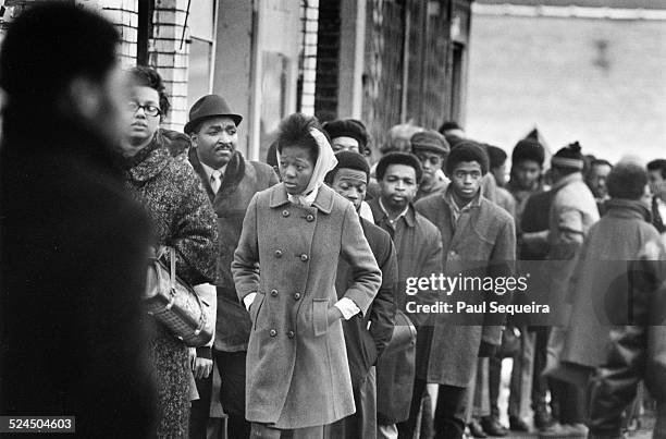 Crowd of people line up outside the Rayner Funeral Home, to pay last respects to slain Black Panther Party leader Fred Hampton, after he was killed...