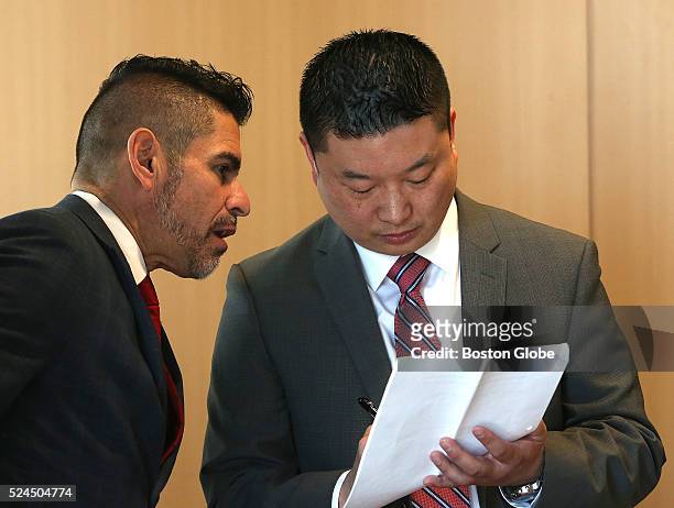 After he spoke, Superintendent Tommy Chang, right, confers with Amalio Nieves, assistant superintendent for social-emotional learning and wellness,...