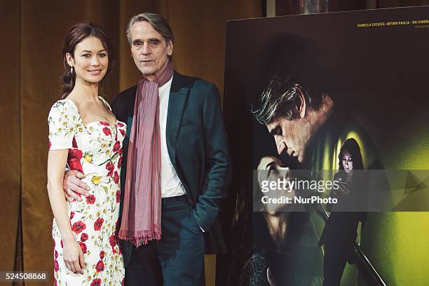 French-Ukraine actress Olga Kurylenko and British actor Jeremy Irons poses during the photocall for the film &quot;La corrispondenza&quot; directed...