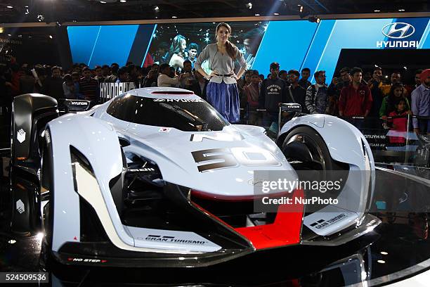 Modal poses with Hyundai Car at the Auto Expo in Greater Noida, on the outskirts of New Delhi in India on Monday, Feb. 8, 2016. The 13th edition of...
