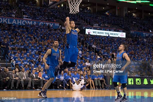 Dwight Powell of the Dallas Mavericks slams two points against the Oklahoma City Thunder during Game Five of the Western Conference Quarterfinals...