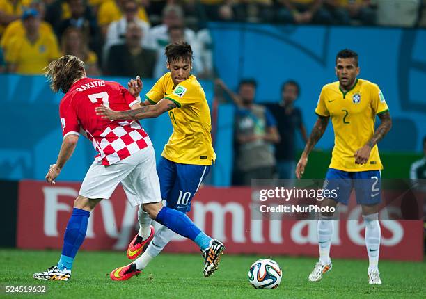 June: Rakitic, Neymar Jr. And Dani Alves in the match between Brazil and Croatia in the group stage of the 2014 World Cup, for the group A match at...