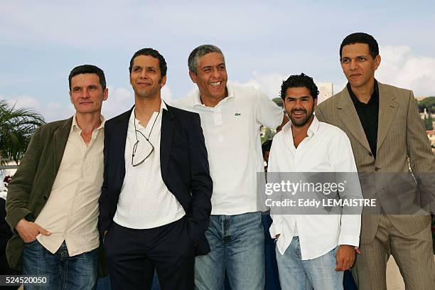 Bernard Bancan, Sami Bouajila, Samy Naceri, Jamel Debbouze, and Roschdy Zem at the photo call of "Indigenes" during the 59th Cannes Film Festival.