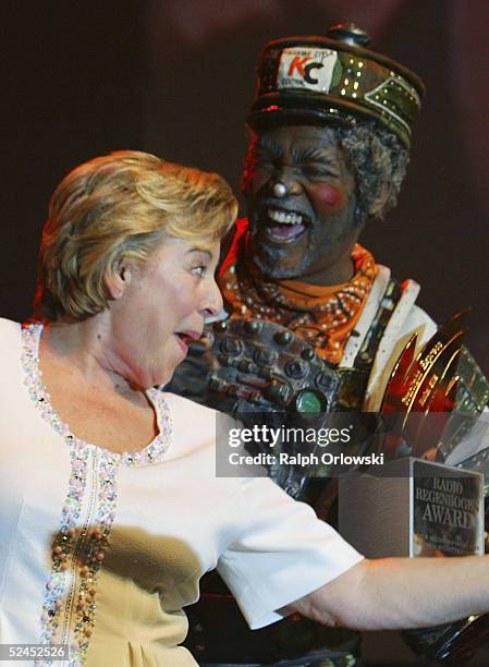 German actress Marie-Luise Marjan dances with a member of the dance ensemble of Starlight Express Musical during the Radio Regenbogen Award 2005, at...