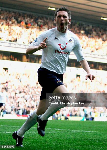 Robbie Keane of Tottenham Hotspur celebrates scoring the winning goal during the Barclays Premiership match between Tottenham Hotspur and Manchester...