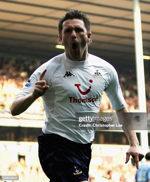 Robbie Keane of Tottenham Hotspur celebrates scoring the winning goal during the Barclays Premiership match between Tottenham Hotspur and Manchester...