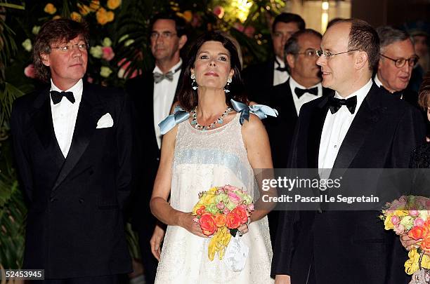 Prince Ernst August of Hanover, Princess Caroline of Hanover and Prince Albert Of Monaco arrive at the Rose Ball 2005 at The Sporting Monte Carlo on...