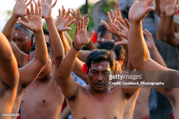 indonesia: kecak ritual chant in bali - uluwatu stock pictures, royalty-free photos & images