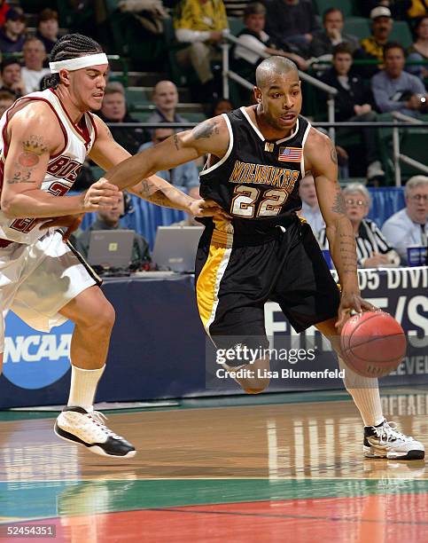 Ed McCants of the Wisconsin-Milwaukee Panthers drives past Sean Marshall of the Boston College Eagles during the second round of the 2005 NCAA...