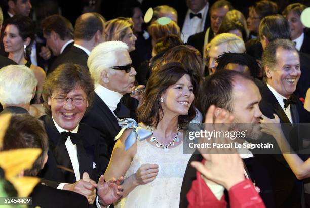 Prince Ernst August, Designer Karl Lagerfeld and Princess Caroline of Hanover dances at the Rose Ball 2005 at The Sporting Monte Carlo on March 19,...