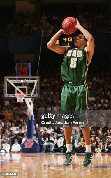 Marvett McDonald of the University of Alabama at Birmingham Blazers attempts a three point shot against the Arizona Wildcats during the 2005 NCAA...