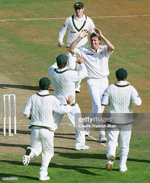 Glenn McGrath celebrates with team mates after trapping Stephen Fleming of New Zealand LBW during day three of the 2nd Test between New Zealand and...