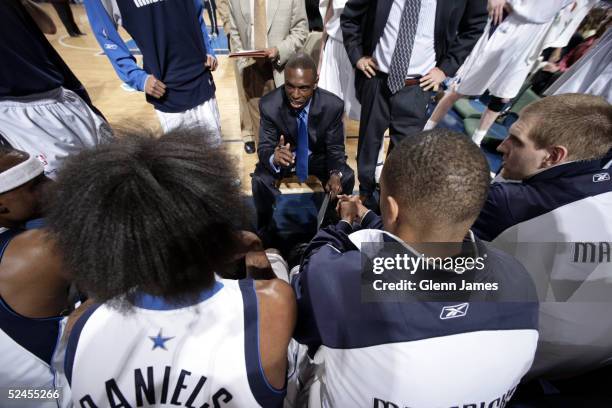 Avery Johnson, new head coach of the Dallas Mavericks, coaches his team in the huddle against the Charlotte Bobcats March 19, 2005 at the American...