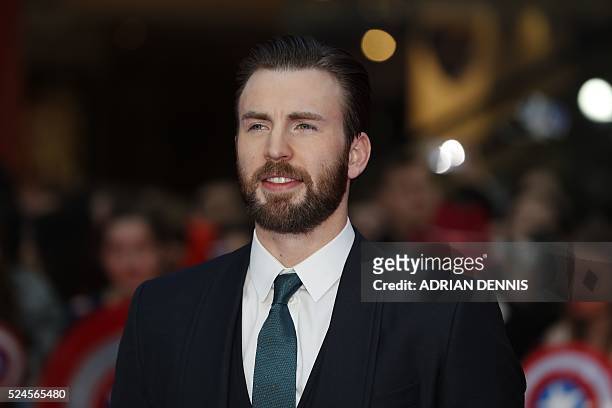 Actor Chris Evans poses on the red carpet arriving for the European Premiere of the film Captain America: Civil War in London on April 26, 2016 / AFP...