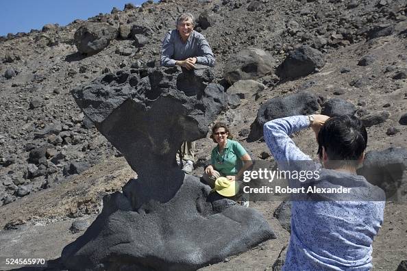 Mushroom Rocks In Death Valley Tourists take photographs at Mushroom Rock in Death Valley National ...