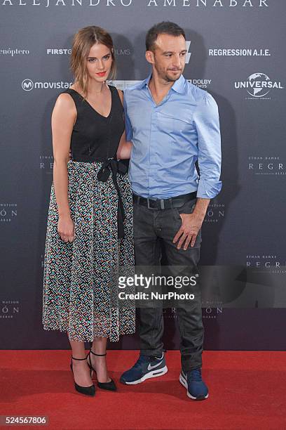 Actress Emma Watson and director Alejandro Amenabar attend a photocall for 'Regression' at the Villamagna Hotel on August 27, 2015 in Madrid, Spain.