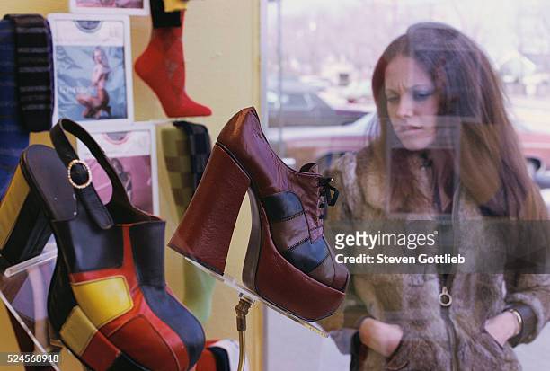 Woman Window Shopping for Platform Shoes