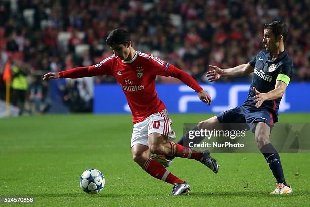 Benfica's forward Gonalo Guedes vies with Atletico Madrid's midfielder Gabi during the UEFA Champions League Group C football match between SL...