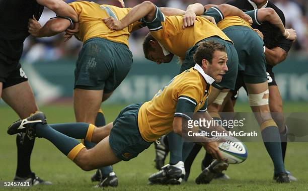 Tim Clark of Australia in action against New Zealand during the cup semi final match on day three of the Rugby World Cup Sevens held at Hong Kong...