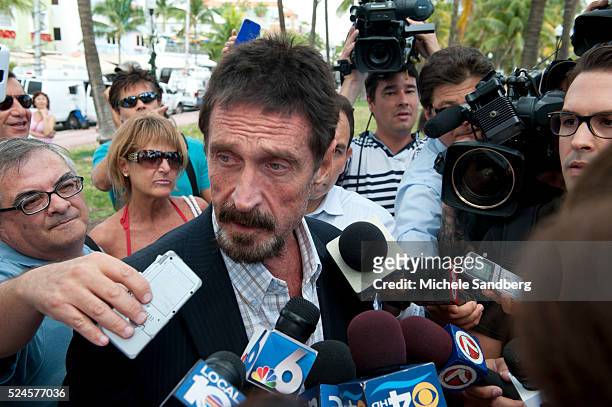 December 13, 2012 - John McAfee talks to the media at the Beacon Hotel where he is staying after arriving last night from Guatemala on December 13,...
