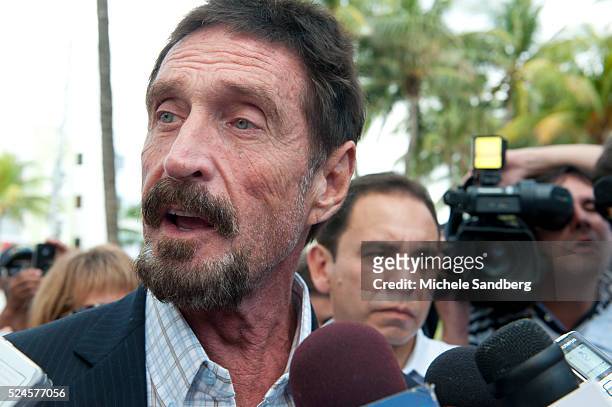 December 13, 2012 - John McAfee talks to the media at the Beacon Hotel where he is staying after arriving last night from Guatemala on December 13,...