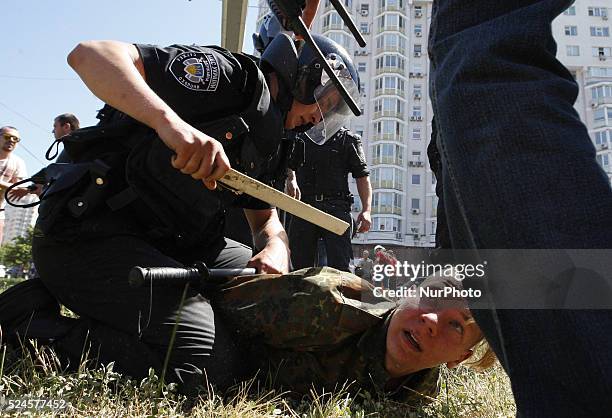 Policemen detain anti-gay protesters during the Gay pride parade in Kiev, Ukraine, 06 June 2015. Representatives of LGBT organizations and their...