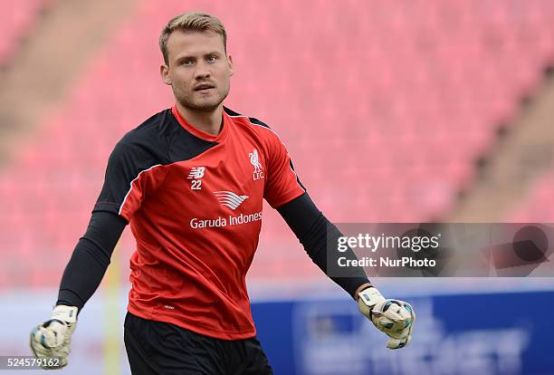 Simon Mignolet warms up during a training session at Rajamangala stadium in Bangkok, Thailand on July 13, 2015. Liverpool will play an international...