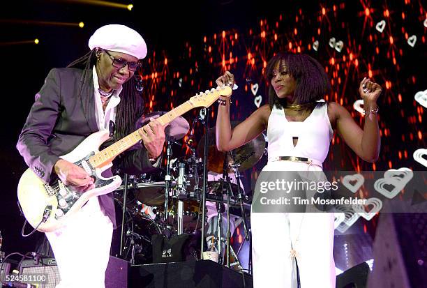 Nile Rodgers and Folami Thompson of Chic perform at Smoothie King Center on April 24, 2016 in New Orleans, Louisiana.