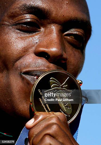 Augustine Kiprono Choge of Kenya celebrates with his medal after winning the Men's Junior Race during the 33rd IAAF World Cross Country Championships...