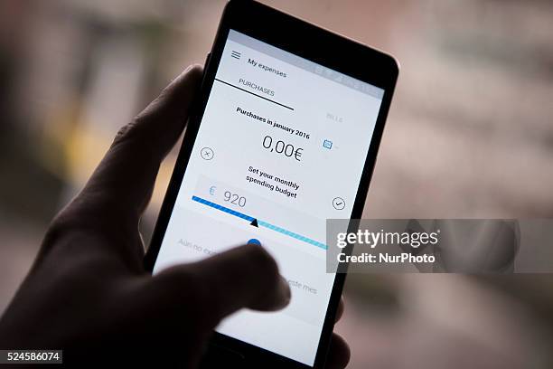 Barcelona, Spain. January 14. A hand using the Imagin Bank app in a smartphone mobile.
