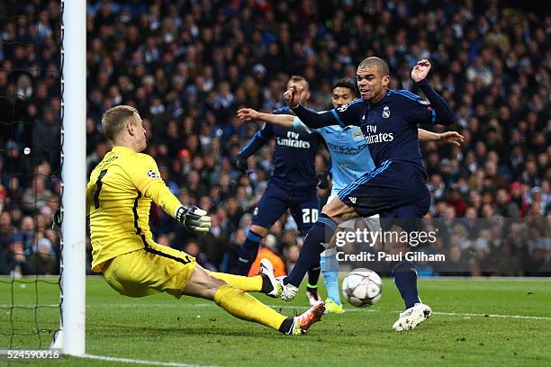 Goalkeeper Joe Hart of Manchester City saves the point blank shot from Pepe of Real Madrid CF during the UEFA Champions League Semi Final first leg...