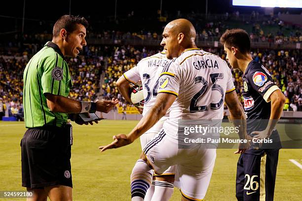 Rafael Garcia complains to the referee after being taken down during the Los Angeles Galaxy vs Club America match of the International Champions Cup...