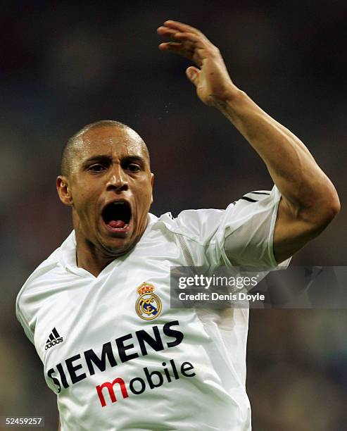 Real's Roberto Carlos celebrates after scoring a goal in a Primera Liga soccer match on March 20, 2005 between Real Madrid and Malaga at the Bernabeu...