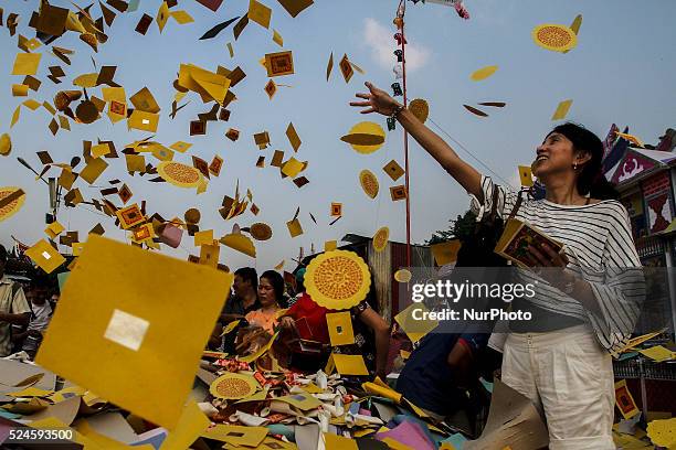 Chinese Indonesians burn fake money to honor their ancestors during the Hungry Ghost Festival in Medan, North Sumatra, Aug. 28. 2015. During the...