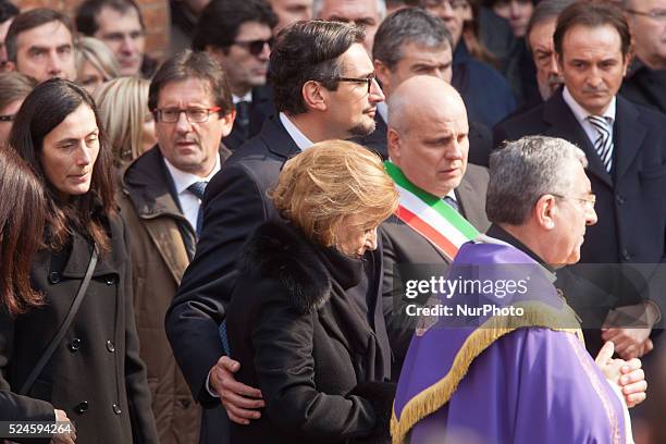 The Maria Franca the widow of Michele Ferrero, escorted by his son Giovanni exit from the church at the funeral of the founder of Ferrero on February...