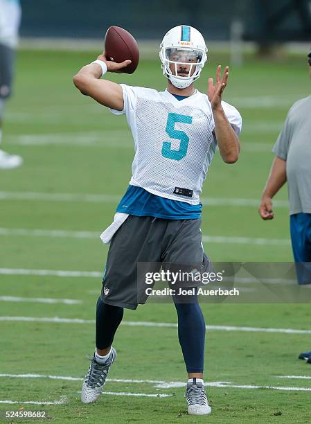 Logan Thomas of the Miami Dolphins throws the ball during the teams voluntary veterans minicamp on April 26, 2016 at the Miami Dolphins training...