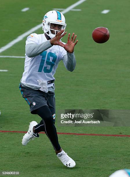 Tyler Murphy of the Miami Dolphins catches the ball during the teams voluntary veterans minicamp on April 26, 2016 at the Miami Dolphins training...