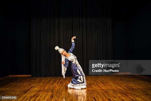 Actress dances in traditional costume of Timurid dynasty, XIV-XV AC, during &quot;Instants of Eternity&quot; show in theater of historical costume...