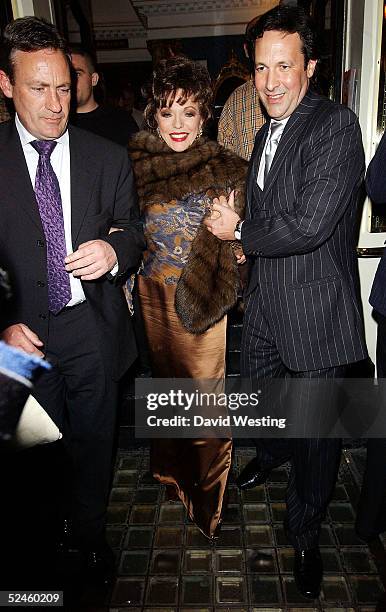 Actress Joan Collins and husband Percy Gibson leave One Knight Only, a variety performance in aid of the Asian Tsunami Appeal, at the Theatre Royal,...