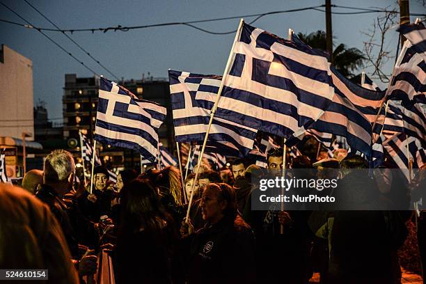 Supporters of the ultra nationalist Golden Dawn party demonstrate supporting the exile of illegal immigrants on World Day against Racism and Fascism...