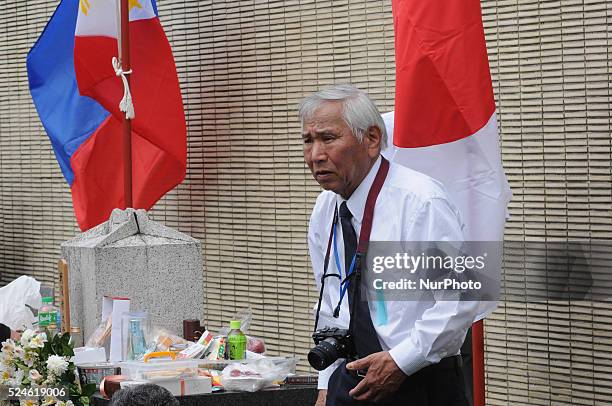 Philippines - Relatives of the fallen Japanese soldiers of WW2 have their photos taken during a ceremony at a Japanese war memorial in the...