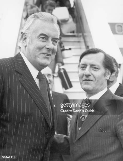 Australian Prime Minister Gough Whitlam is welcomed at London Airport by David Ennals, 19th December 1974. Whitlam is in Britain for talks with prime...