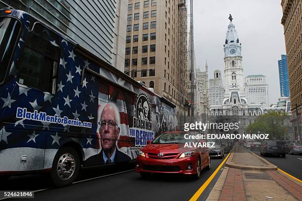Bus of supporters of Democratic presidential candidate Bernie Sanders drives down Broad Street during Pennsylvania's primary election on April 26,...