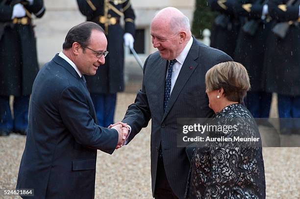 Peter Cosgrove General Governor of the Australian Commonwealth and his wife Lynne Cosgrove are welcomed by French President Francois Hollande for a...