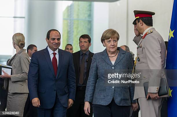 German Chancellor Angela Merkel and Egyptian President Abdel Fattah al-Sisi arrive for a press conference on June 3, 2015 at the Chancellery in...