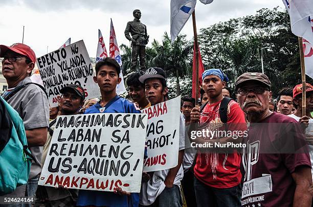 Working class Filipinos gather at the Liwasang Bonifacio as Militant groups mark the 150th birthday of Filipino patriot, Andres Bonifacio by holding...