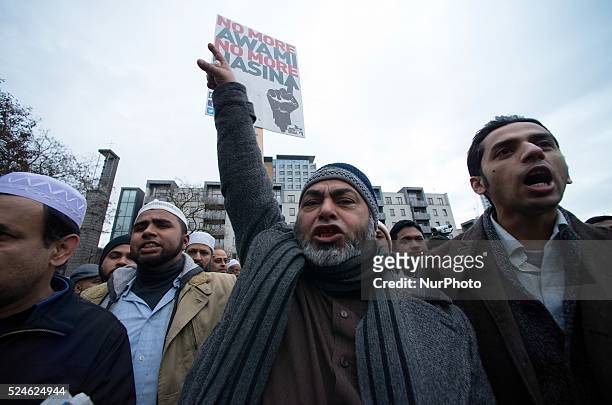 Bangladeshi and supporters protest in Altab Ali Park against the execution of leader Abdul Quader Molla convicted of war crimes during the 1971...
